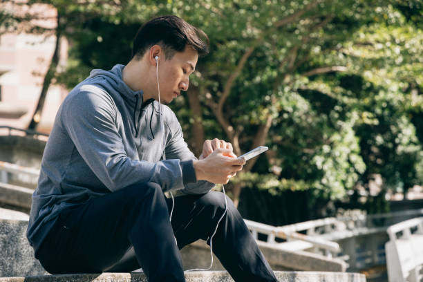 istock male runner resting portrait 1295302107