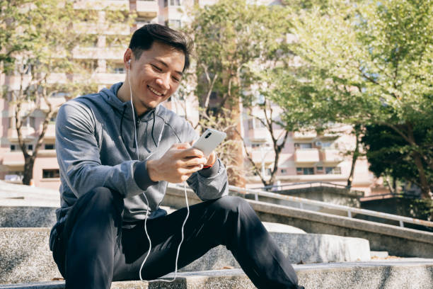 istock male runner resting portrait 1295302130