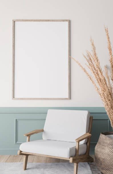 istock Mockup frame in bright living room design, vertical wooden frame on classic blue wall 1295306487