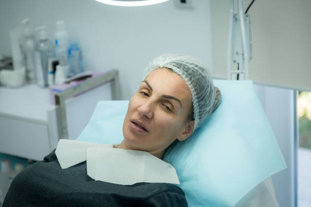 istock Female patient preparing for botox 1295307767