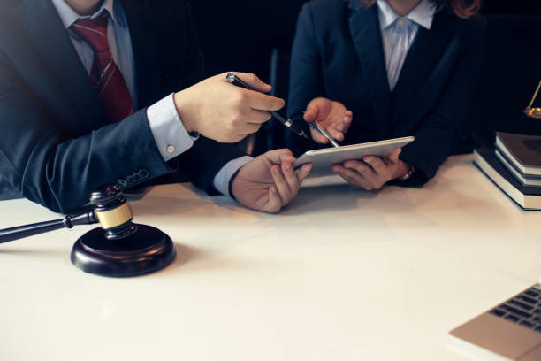 istock Lawyer discussed together in the office. 1295309775