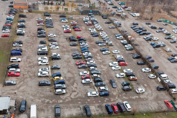 istock Outdoor parking lot with semi-durable surface, top view 1295311318