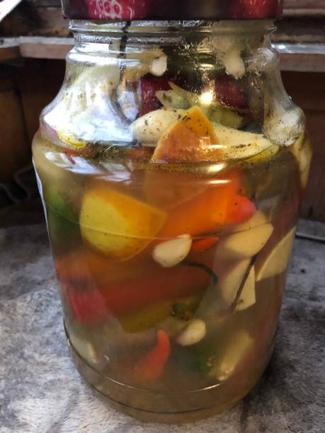 istock Vegetarian pickles in jar 1295323715