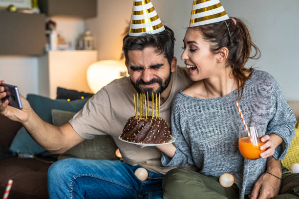 istock Young couple having a celebration at home 1295324475