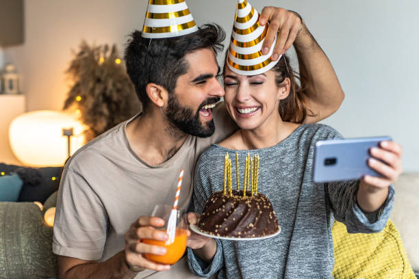istock Young couple having a celebration at home 1295325905