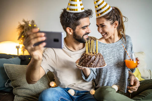 istock Young couple having a celebration at home 1295325938