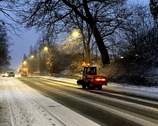 istock Snow vehicle working in a blizzard. 1295329823