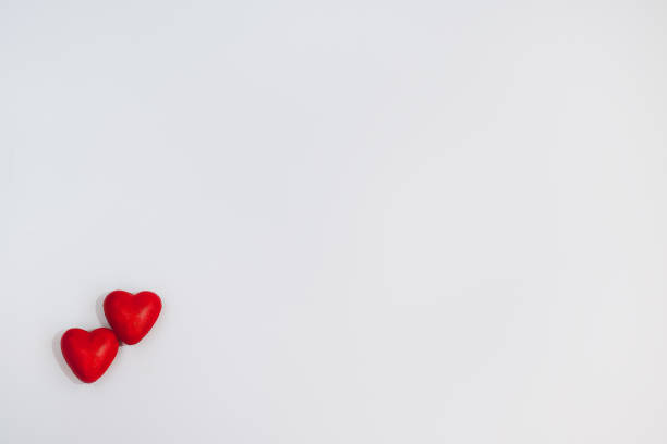 istock Red hearts on light gray background. Valentine's day concept. 1295336067