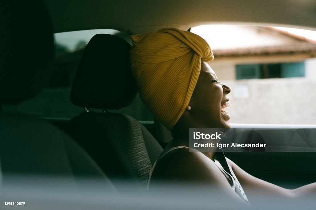 Laughter in the car Driving Stock Photo