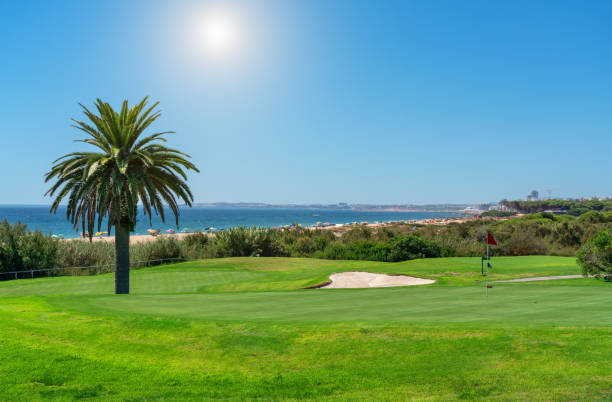 Resort luxury beaches, golf courses with palm trees, overlooking the sea for tourists to relax. Portugal algarve stock photo