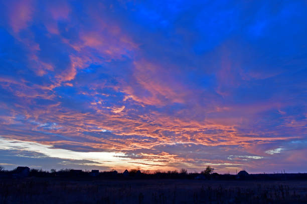Pink sky with clouds at beautiful sunset as natural background