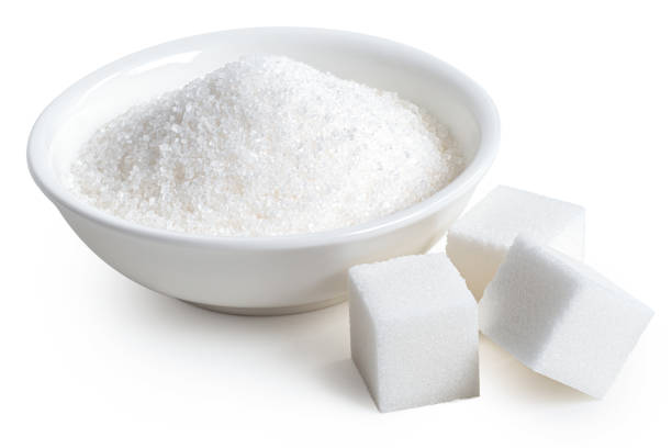 istock White sugar cubes and granulated sugar. 1295354767