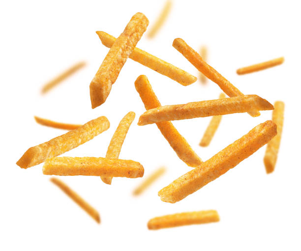 istock French fries levitate on a white background 1295358841