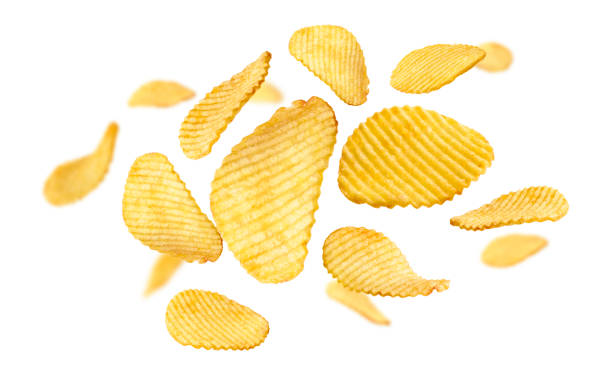 istock Fluted potato chips levitate on a white background 1295358846