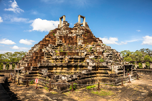 The Baphuon is a temple at Angkor, Cambodia. It is located in Angkor Thom, northwest of the Bayon. Built in the mid-11th century, it is a three-tiered temple mountain built as the state temple of Udayadityavarman, dedicated to the Hindu God Shiva.