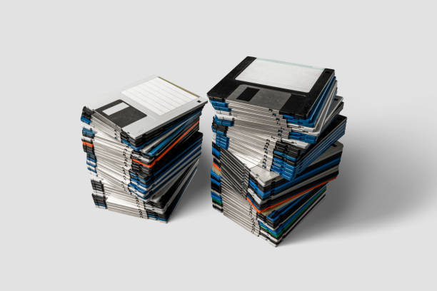 zwei stapel 3,5-zoll-diskette - computerdiskette stock-fotos und bilder