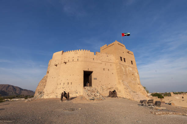 The outside of the historic Fujairah Fort, United Arab Emirates The outside of the historic Fujairah Fort, United Arab Emirates, horizontal fujairah stock pictures, royalty-free photos & images