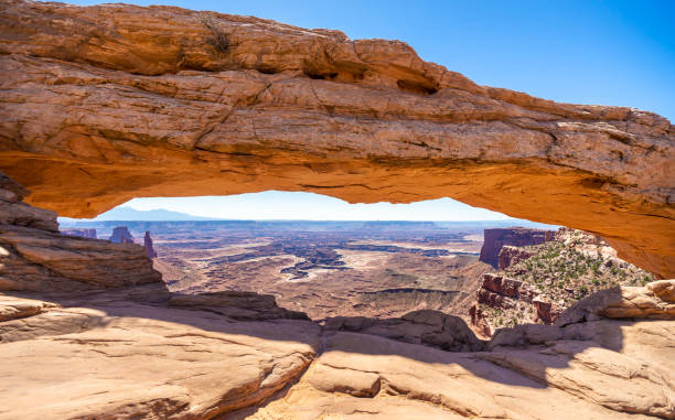 Mesa Arch in Islands in Sky Section of Canyonlands National Park in Utah, USA Mesa Arch in Islands in the Sky section of Canyonlands National Park in Utah, USA. la sal mountains stock pictures, royalty-free photos & images