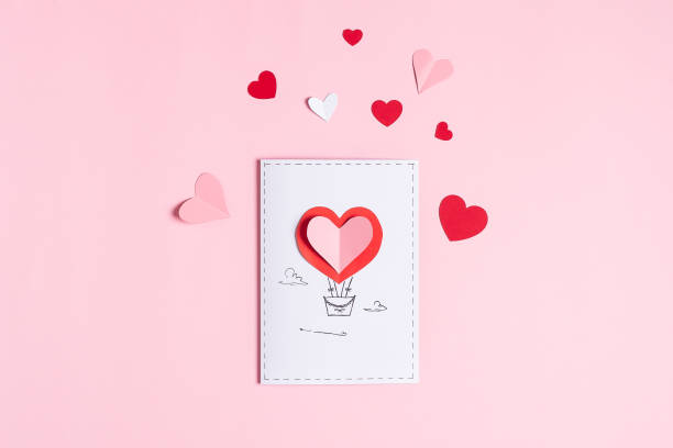 DIY Valentine greeting card, Top view Making of handmade Valentine greeting card from paper. DIY, hobby concept, gift idea, decor with children. Instructions step by step. Step 13 book heart shape valentines day copy space stock pictures, royalty-free photos & images