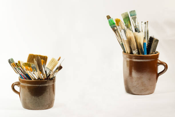 Art Supplies in Stained Holders Inside Artist’s Workspace