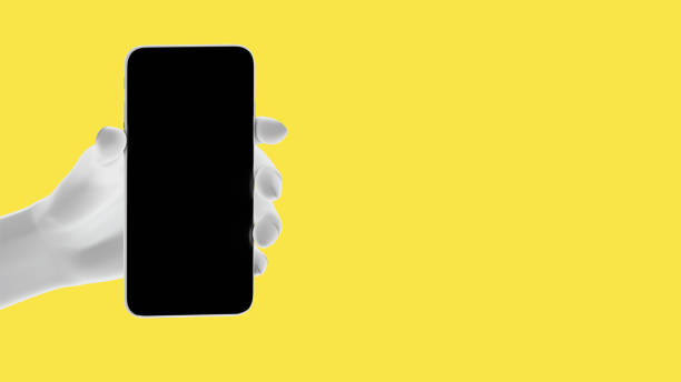 istock Hand holding phone, isolated on yellow background. 3d rendering 1295378944