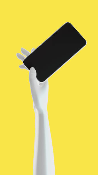 istock Hand holding phone, isolated on yellow background. 3d rendering 1295379009