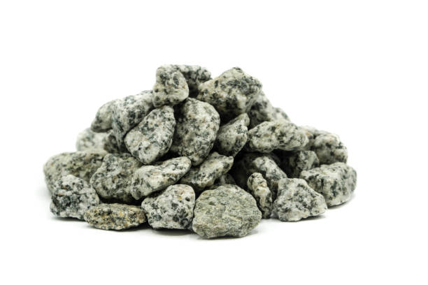 istock Pebble heap isolated on white background 1295383005