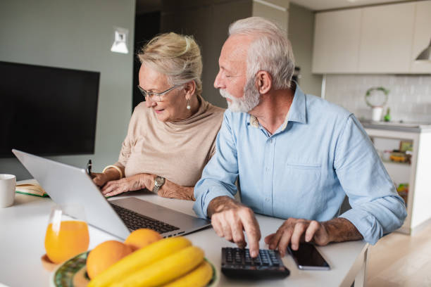 istock Home finances planning for a senior couple 1295385559