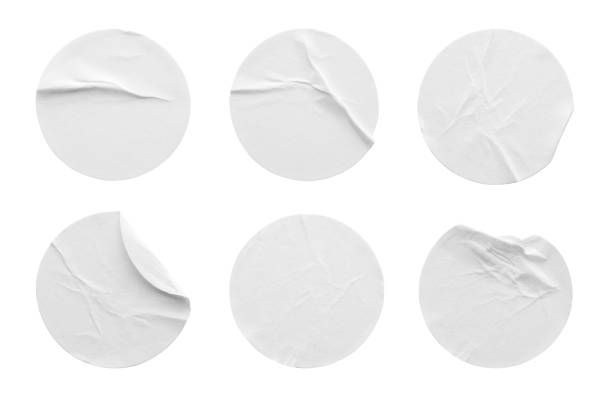 istock Blank white round paper sticker label set collection isolated on white background with clipping path 1295387960
