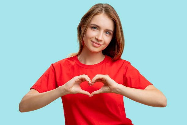 istock compassion sign love care supportive woman heart 1295388085