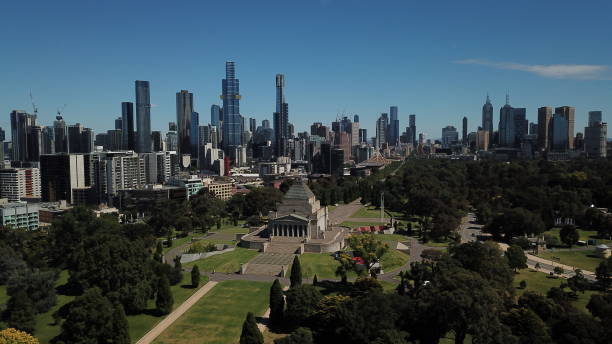 Melbourne city skyline Aerial shots of Melbourne city against a bright blue sky shrine stock pictures, royalty-free photos & images