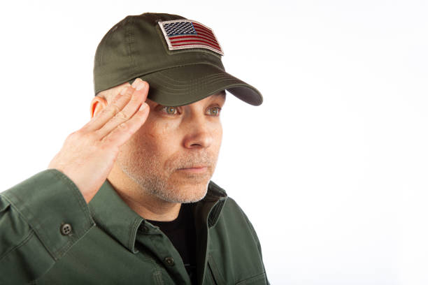 istock Saluting Military Veteran 1295407298