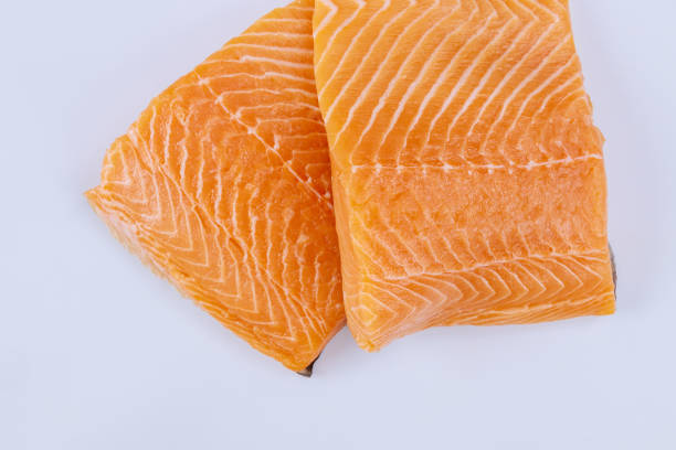 istock Fresh salmon fillet with the isolated on white background. 1295413601
