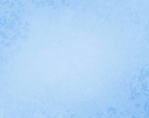 istock Light blue background with old vintage grunge texture on border and corners, pastel blue paper with soft light center 1295413756