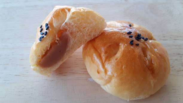 istock Taro filled bun on wood table. 1295416016