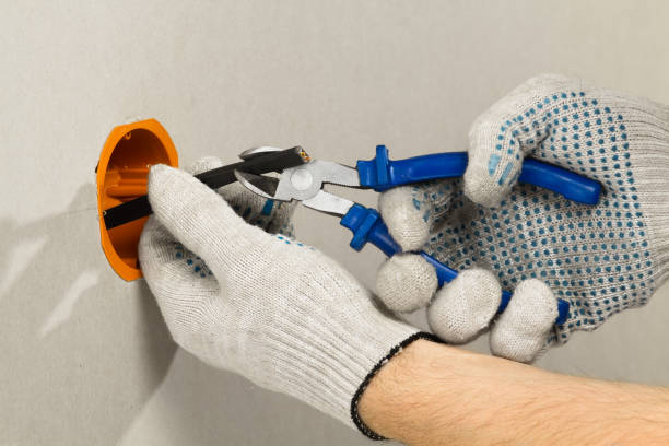 istock hands with a cutter shorten the wires 1295416028