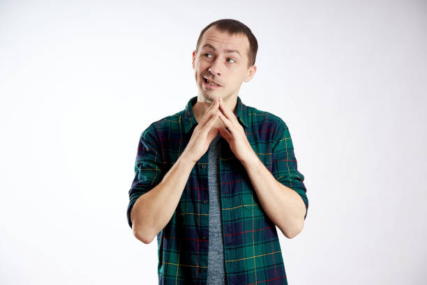 istock Man came up with a brilliant idea. Guy on a white background isolate 1295434351
