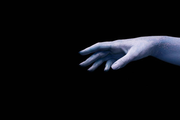 istock A beautiful woman's hand with dry skin reaches for something 1295435729