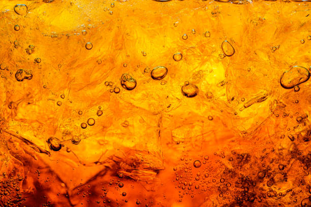istock Cola with Ice. Food background ,Cola close-up ,design element. Beer bubbles macro,Ice, Bubble, Backgrounds, Ice Cube, Abstract Backgrounds 1295439018