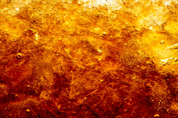 istock Cola with Ice. Food background ,Cola close-up ,design element. Beer bubbles macro,Ice, Bubble, Backgrounds, Ice Cube, Abstract Backgrounds 1295439019