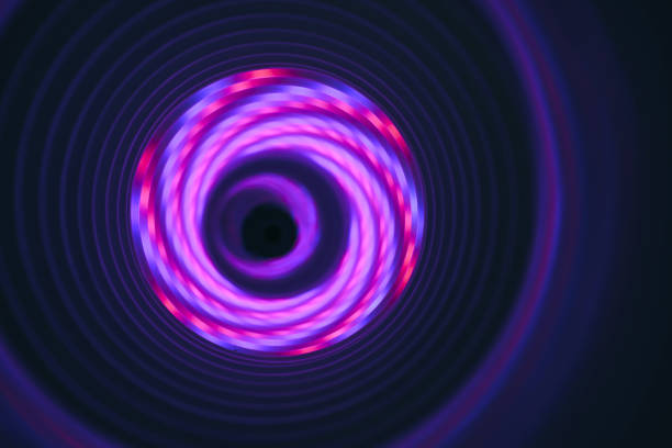 istock Abstract swirl tunnel with purple light on a background pattern textured for design. 1295440448