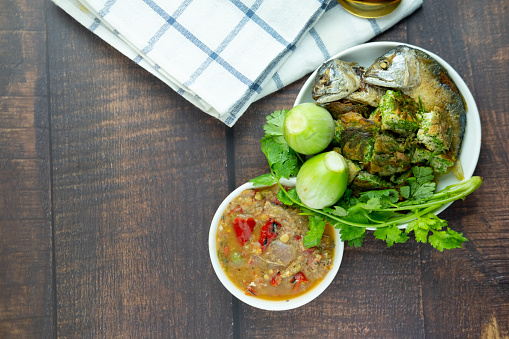 Fermented fish spicy dip (Nam Prik Pla-ra as Thai pronunciation) served wiht fried mackerel and fresh vegetable. Thailand style food