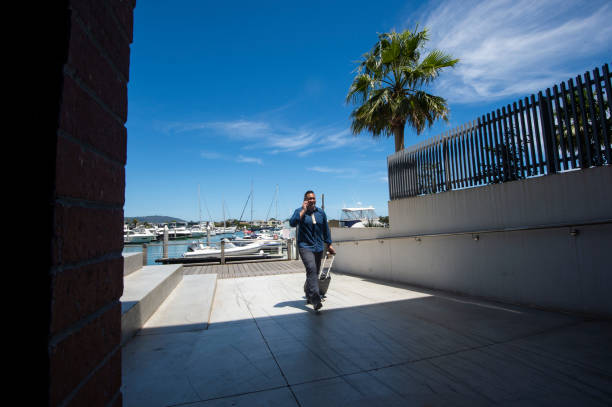 istock Travelling Business Professional Walking with Case 1295448429