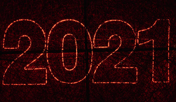 istock symbol of new year 2021 red neon lights 1295449596