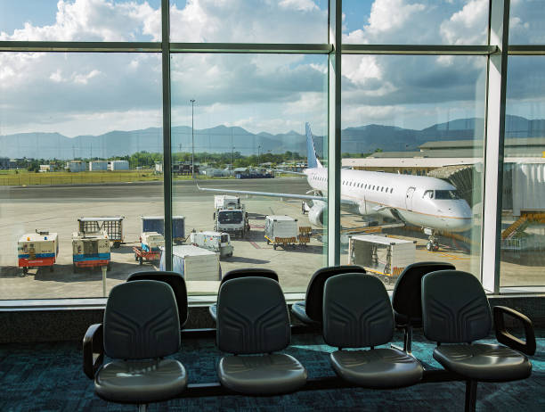 istock Airport departure lounge seating area 1295450886