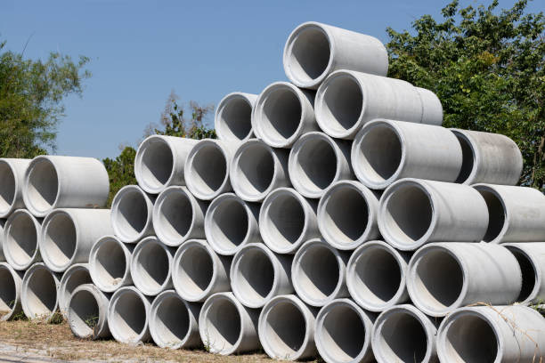 istock Concrete drainage pipes on site yard. 1295451793