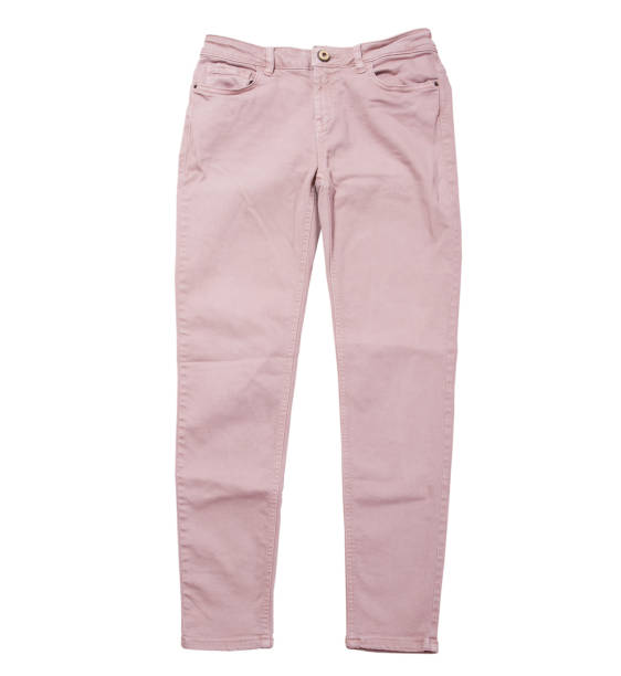 istock Female pants, light pink denim pants top view isolated on white background, folded slim pants 1295457347