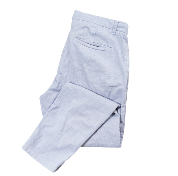 istock Ligt blue pants isolated on white background, folded pants top view, fashion cloth element flatlay 1295457367