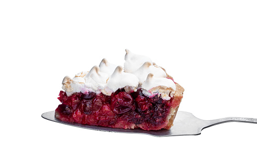 Meringue  covered cranberry tart pie slice isolated on white