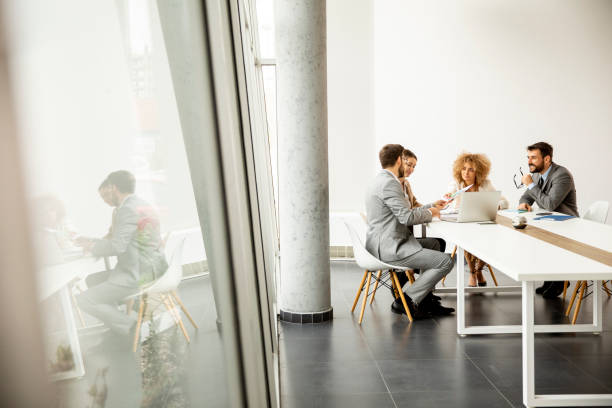istock Multiethnic business people working together in the office 1295459111